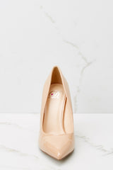Front view of these pumps that feature a pointed toe, side seaming, and a thin heel.