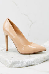 Outer-side view of these pumps that feature a pointed toe, side seaming, and a thin heel.