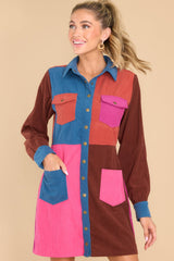 Front view of this dress that showcases the color-block pattern in shades of brown, blue, orange, and pink.