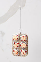 This multi-colored ornament features six berry-filled muffins.