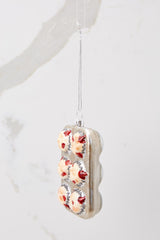 Side view of this ornament that features six berry-filled muffins.
