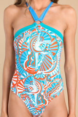 Close up view of this swimsuit that features a high neck self-tie closure around the back of the neck, an O-ring detail at the bust, and removeable pads.