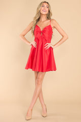 Full body view of this dress that features a babydoll silhouette. 