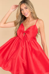This all red dress features a sweetheart neckline with a key hole detail on the bust, the bow at the bust is non-adjustable, adjustable spaghetti straps, zipper on the back, and a babydoll silhouette. 