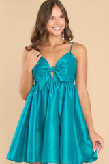 Front view of this dress that features a sweetheart neckline with a keyhole detail on the bust and a bow at the bust is non-adjustable.