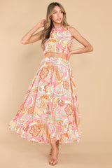 Front view of this dress that showcases the bohemian pattern of the fabric.
