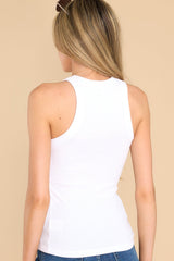 Back view of this top that features a halter neckline and soft, ribbed material.