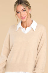 Front view of this sweater that features a v-cut neckline.