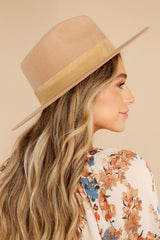 Side view of this hat that showcases a silhouette inspired by men's vintage styles, features a black tonal 100% suede band, with a brim measurement of 8.5 cm,  a 50+ UPF rating. 
