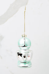 Front view of this ornament that features a stand mixer design with a silver bowl.