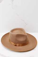 Top view of this hat that features a teardrop crown with an upturned brim and a band around the crown. 