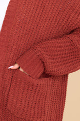 Close up view of this cardigan that features functional pockets.