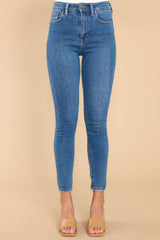 Front shot of these skinny jeans that feature functional front pockets and a relaxed fit around the ankles.