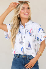 Front view of this top that showcases the sailboat pattern of the fabric.