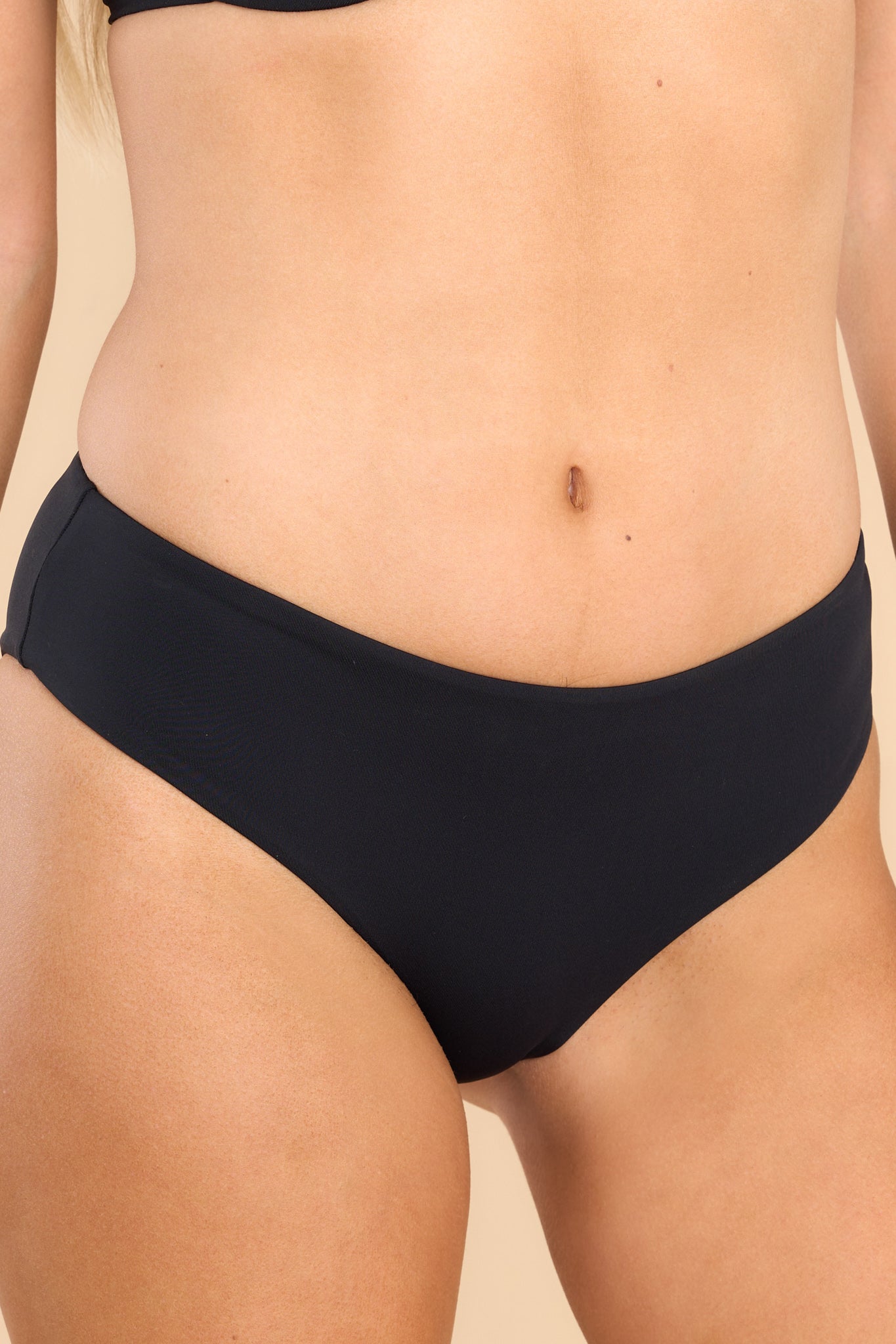 These all black bottoms feature a low-rise and a stretchy material.