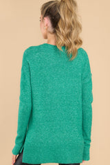 Back view of this sweater that features a crew neckline, a ribbed hem and sleeve cuffs, 3.5