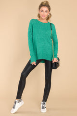 Full body view of this sweater that features a crew neckline, a ribbed hem and sleeve cuffs, 3.5