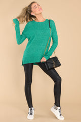 This green sweater features a crew neckline, a ribbed hem and sleeve cuffs, 3.5