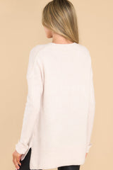 Back view of this sweater that features a crew neckline, a ribbed hem and sleeve cuffs, 3.5