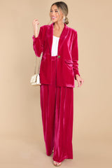 Full body view of these pants that feature a high waist velvet-like material and two functional waist pockets.