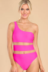 Front view of this one-piece that features a one shoulder neckline, mesh cutouts around the waist, and removeable padding.