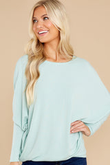 Front view of this pull over top that features a round neckline.