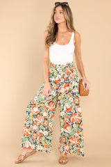 These multi-colored pants feature an elastic waistband with an adjustable self-tie and a wide-leg, flowy fit.